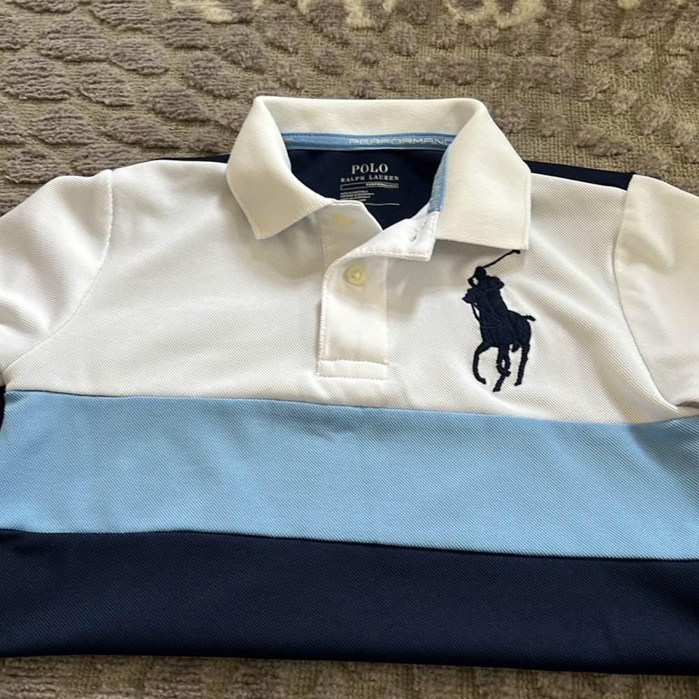 Polo performance collared shirt in white, light blue, navy blue.